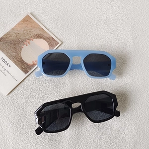 Retro large frame geometric sunglasses in sky blue and black with thick resin temples