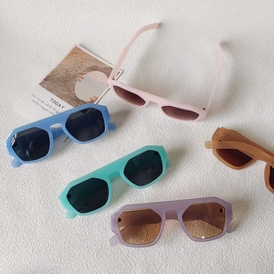 Retro oversized geometric sunglasses in pastel colors with matte resin frames