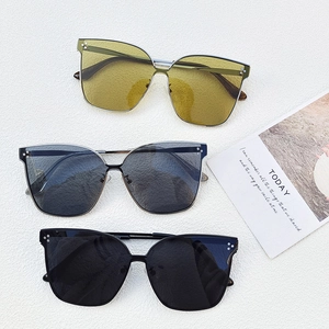 Three pairs of oversized square fashion sunglasses with decorative silver rivets on the frame