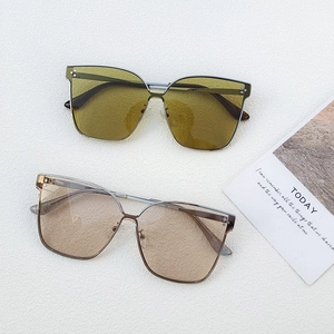 Stylish oversized square sunglasses with metal rivets in olive and brown lenses