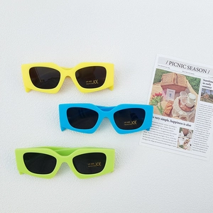 Polygonal UV400 kids sunglasses in yellow, blue and green with modern geometric frame