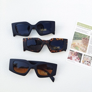 Three pairs of geometric kids sunglasses in matte black and tortoiseshell with UV400 lenses
