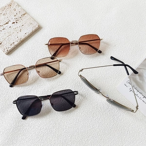 Vintage metal frame kids sunglasses with UV protection in four stylish lens colors