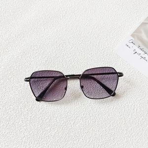 Detail view of children's geometric metal sunglasses with purple gradient lenses