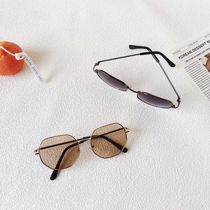 Octagonal metal frame children's sunglasses with brown and gradient grey lenses
