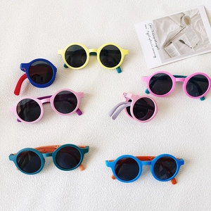 Lunettes de soleil rondes et pliables pour enfants avec protection UV en couleurs vives
