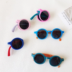 Lunettes de soleil rondes pliables pour enfants en plusieurs couleurs avec protection UV