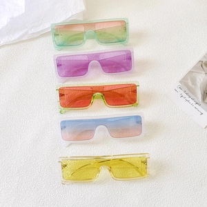 Five pairs of rectangular oversized sunglasses in vibrant gradient colors with one-piece lenses