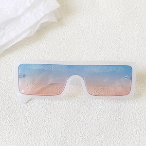 Detail of white matte frame sunglasses with blue to pink gradient one-piece lenses