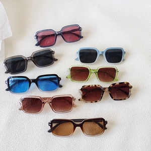 Set of retro square leopard print sunglasses in various colors on white background