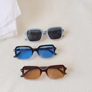 Three pairs of vintage square sunglasses in blue, black, and leopard gradient frames