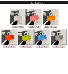 Detail view of colorful acrylic box bags with heart shaped handles and metal chains