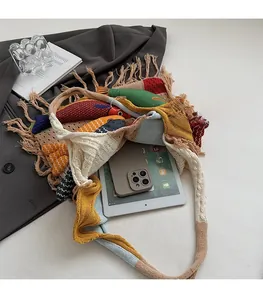Interior view of knit tote bag showing large capacity for tablet and smartphone