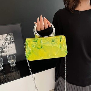 Acrylic evening clutch with green marble texture and silver horseshoe handle