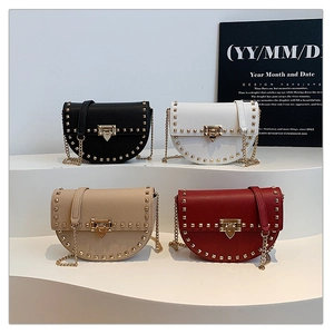 Collection of saddle crossbody bags with rivet studs in black, white, beige, and red colors