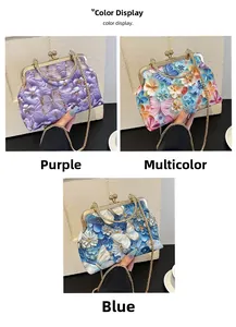 Detail of vintage shell bags with butterfly embroidery and elegant gold chain straps