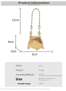 Macro detail of a shell-shaped gold metal mini bag charm with size dimensions 6x6x2cm