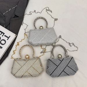 Elegant rhinestone evening bags in gold, silver and black with pearl clasp and chain strap