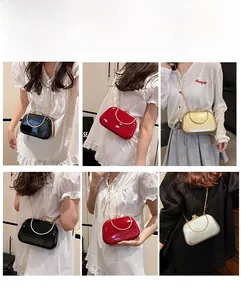 Variety of glossy evening clutch bags showing metallic handles and various styling ways