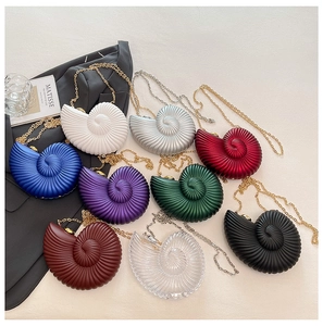 Detailed collection of colorful acrylic conch shell clutch bags with elegant metal chains