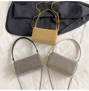 Detailed view of rhinestone crossbody pillow bags in gold, silver and black shades