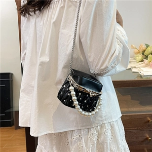 Quilted black mini handbag with sparkling rhinestones, pearl handle and chain strap