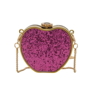 Sparkly heart shaped evening clutch bag with rose red sequins and gold chain strap