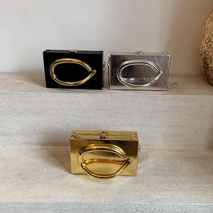 Chic acrylic box clutches with curved metal handles in black, gold, and silver