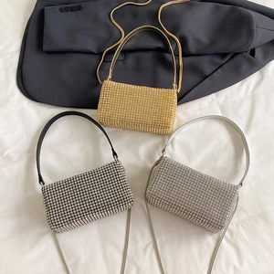 Chic rhinestone pillow bags in gold, black, and silver with metal chain straps