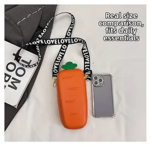 Detailed view of creative carrot-shaped PU leather phone bag with wide love strap