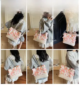 Vues détaillées du sac cabas en dentelle florale avec fleurs 3D et chaîne dorée