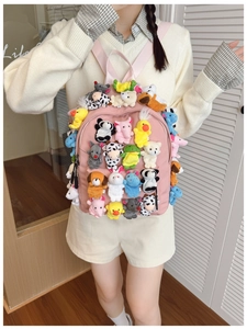 Pink canvas backpack decorated with adorable mixed plush animal dolls for girls