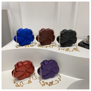 Detail of 3D flower mini crossbody bags in five colors with elegant gold chain straps