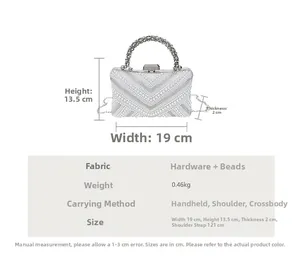 White pearl evening clutch bag showing detailed dimensions of 19x13.5x2cm with chain strap