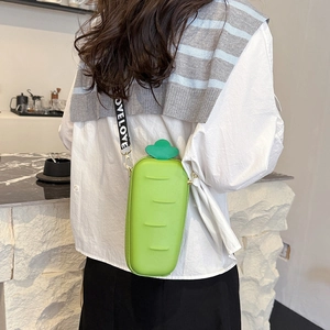 Creative green carrot-shaped mini crossbody bag with a branded LOVE strap for women