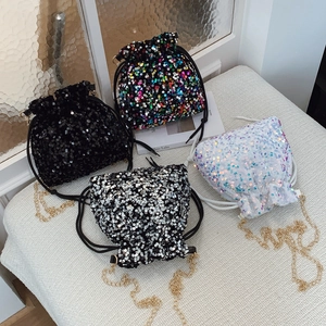 Sparkly sequin bucket bags in four colors with gold chain straps and drawstring closure