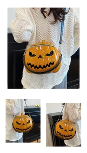 Detailed close-up of a pumpkin-shaped crossbody bag with glossy finish and devil face