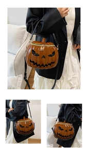 Close-up of Halloween pumpkin crossbody bag with jack-o'-lantern face and gold zipper