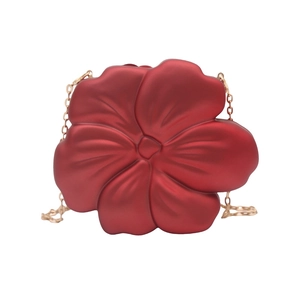 Elegant red flower-shaped acrylic evening clutch bag with gold chain shoulder strap