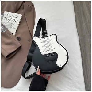 Detail of creative electric guitar shaped crossbody bag with metallic rivets and strap