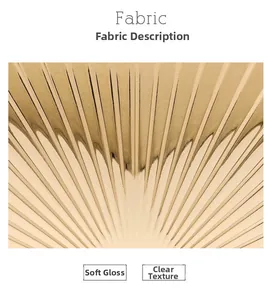 Detail of champagne gold box bag showing radial pleated fabric with satin silk luster