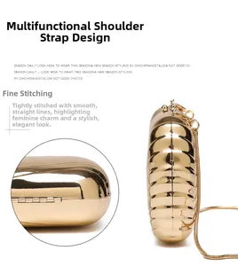 Detail of metallic wavy texture and gold snake chain on luxury evening box clutch bag