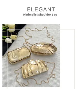 Detailed view of luxury gold metallic evening clutches with elegant shell and hammered textures