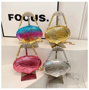 Shell shaped acrylic clutch bags with metallic finish and beaded handles in four colors