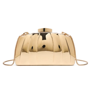 Elegant gold shell-shaped metallic box clutch with polished vertical ribs and chain strap