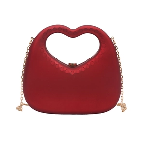 Elegant red heart-shaped evening clutch bag with matte finish and golden chain strap