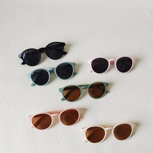 Kids trendy round sunglasses in multiple colors with matte frames and UV protection
