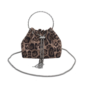 Leopard print bucket bag with silver metal ring handle and chain tassel detail