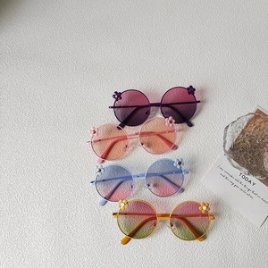 Floral round frame kids sunglasses set in purple pink blue and yellow for summer