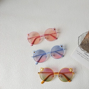 Three pairs of vintage flower round frame kids sunglasses with colorful gradient lenses
